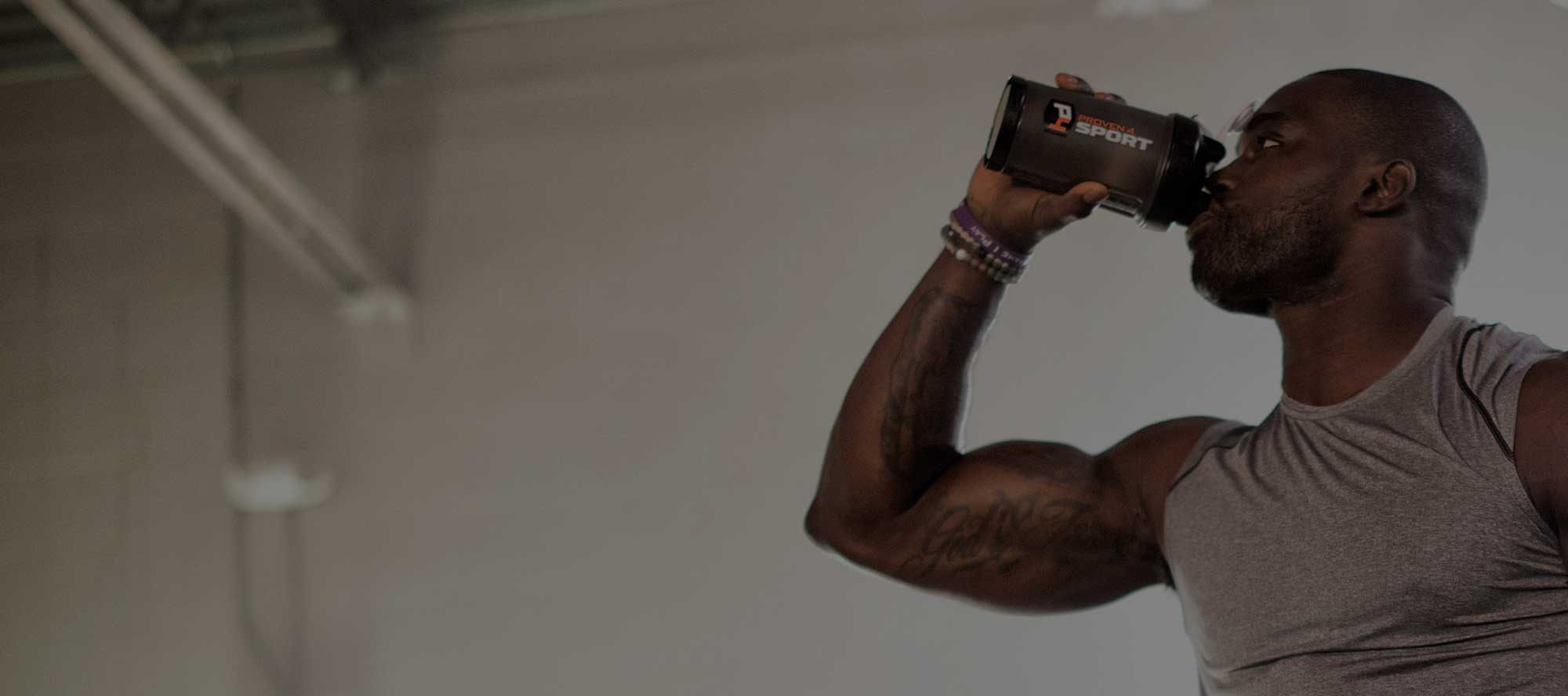Athlete drinking Proven4 NSF Certified for Sport supplement – Guaranteed banned substance free.