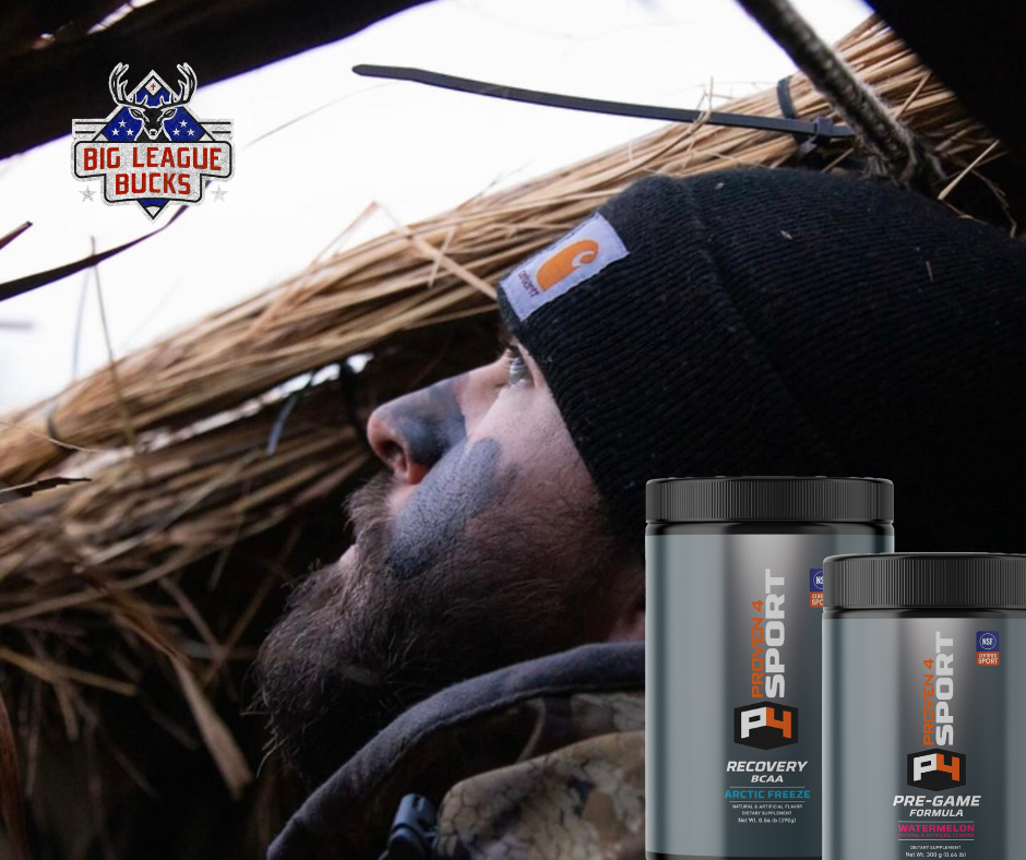 Stealth & Focus: MLB All-Star James McCann Fueled by Proven4 in the Blind MLB catcher James McCann sitting in a hunting blind with Proven4 Pre-Workout, demonstrating the mental focus and steady energy required for elite-level hunting and professional athletics.